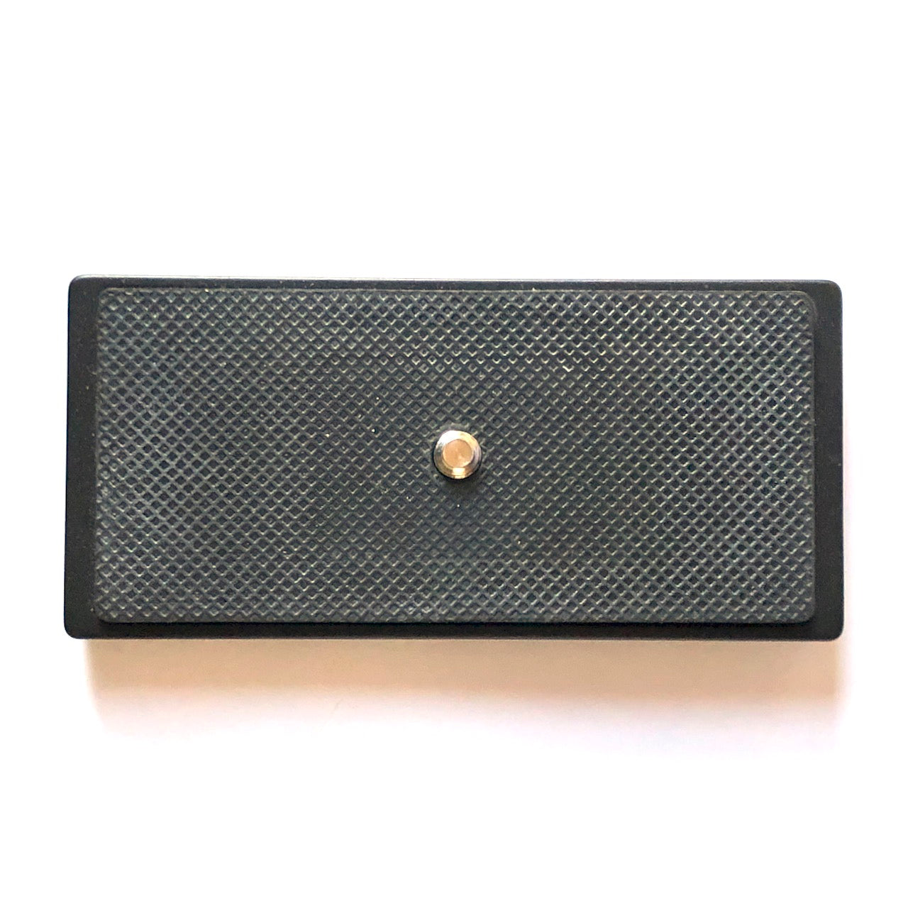 Arca-style quick release plates