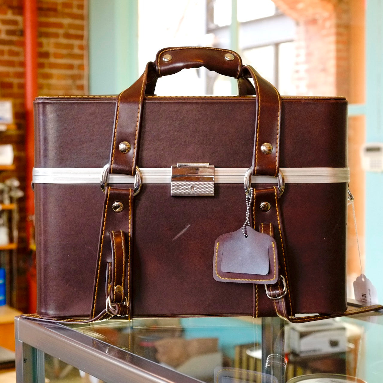 Brown vinyl hardsided case